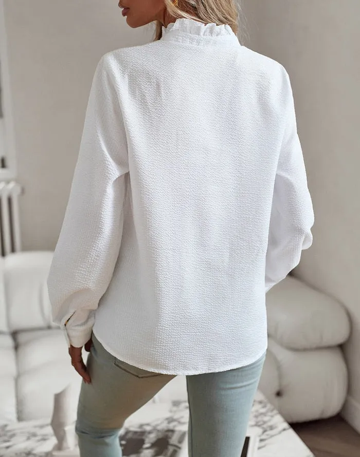 Modische Bluse mit langen Ärmeln und Streifenmuster
